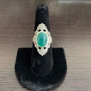 Ornate Ring with Dark Green Stone